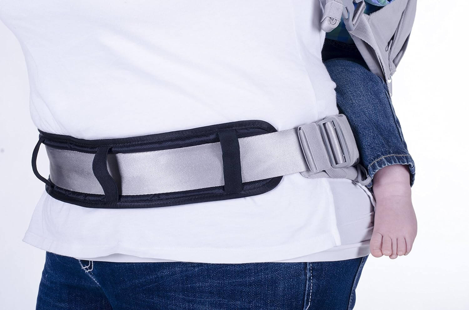 Close up showing side view of woman with baby wearing the Waist Pad on a Pure Carrier by Onya Baby