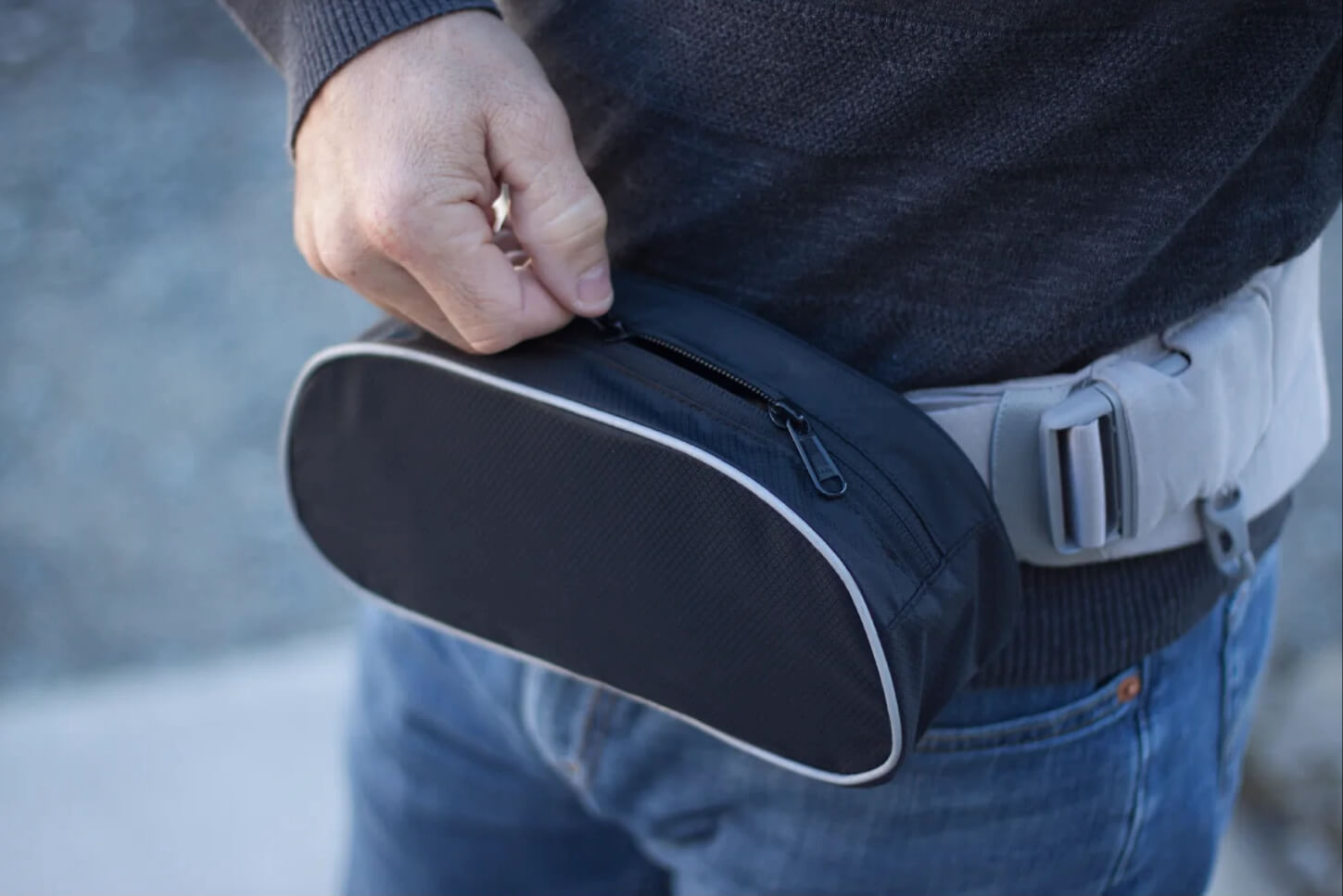 Close-up of a Hipster Bag by Onya Baby showing how it attaches to waist belt of carrer